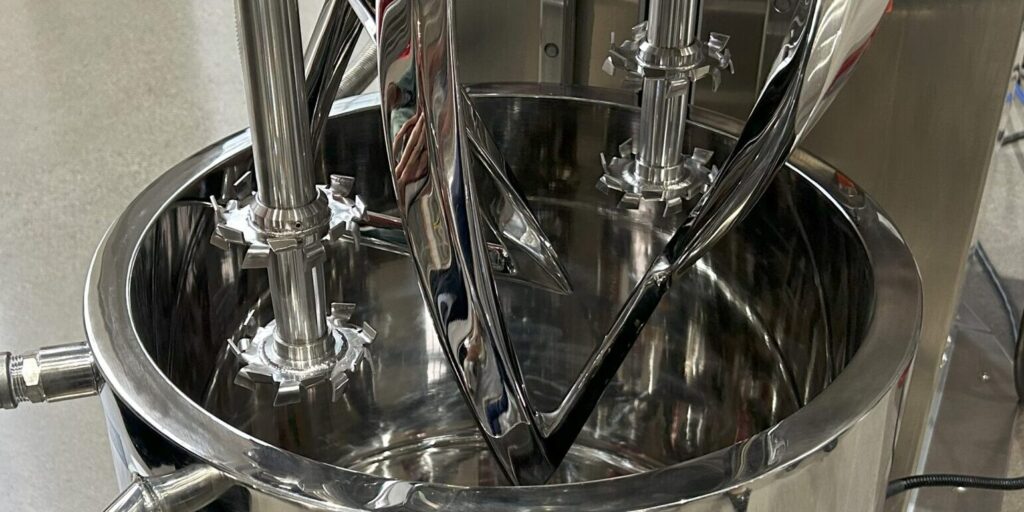 Mixer for production of electrode slurry